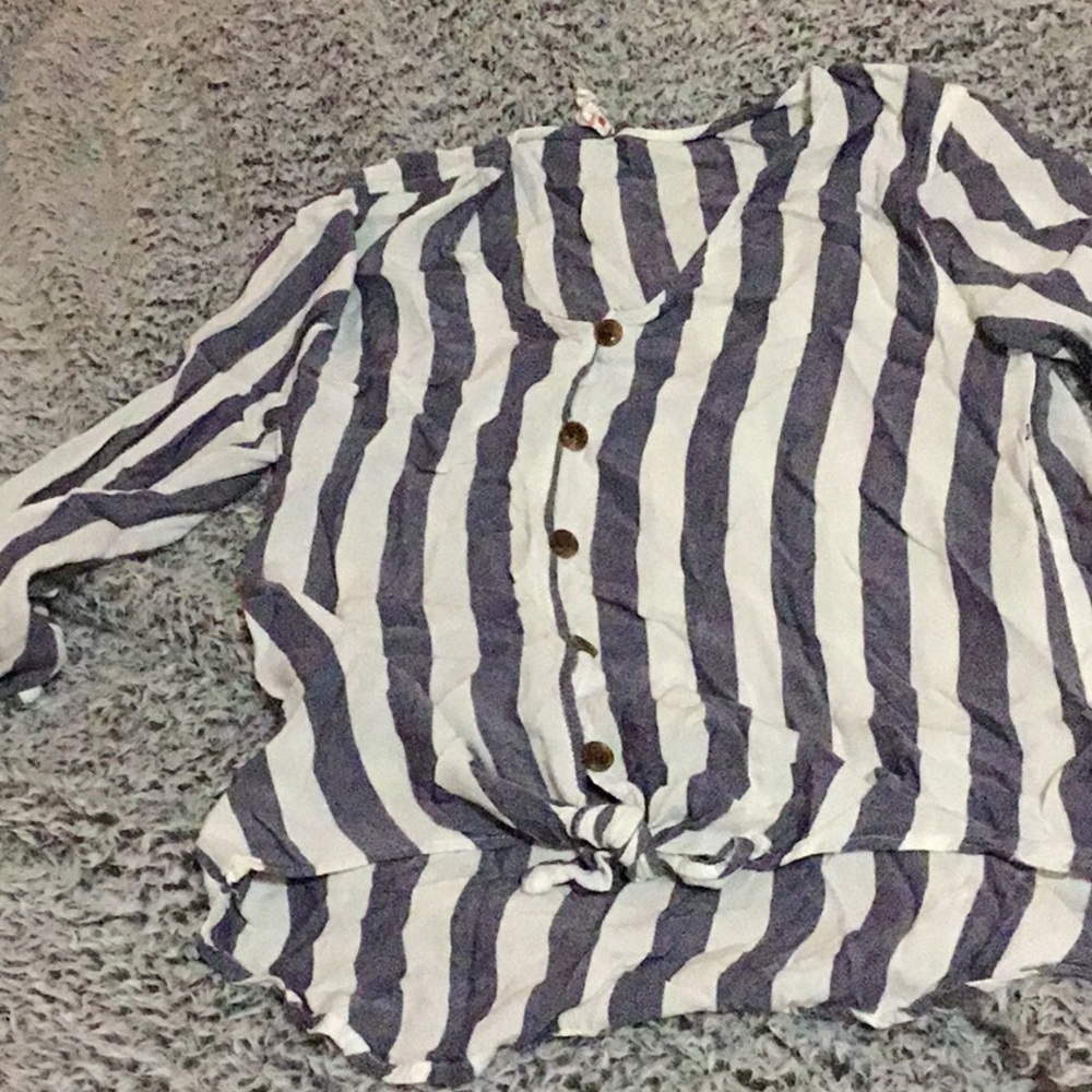 A never worn striped button up shirt